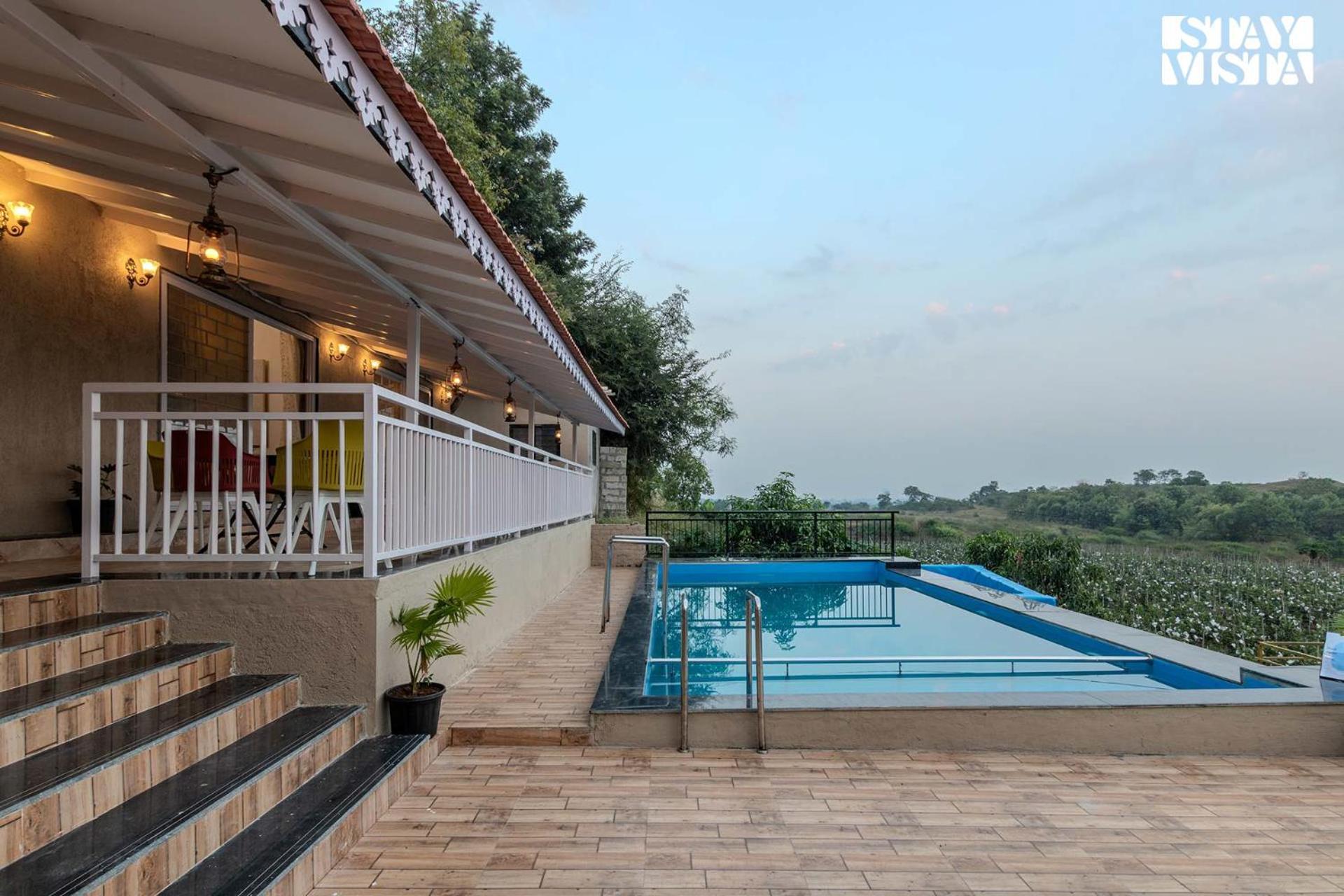Stayvista'S Harvest Haven - Pool-View Villa With Deck & Machan Near Sula Nászik Kültér fotó